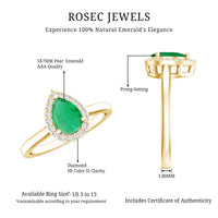 Real emerald teardrop engagement ring with diamond halo featuring a rose gold band from Rosec Jewels.