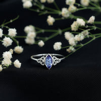 Natural Bezel Set Marquise Tanzanite Promise Ring with Celtic Knot