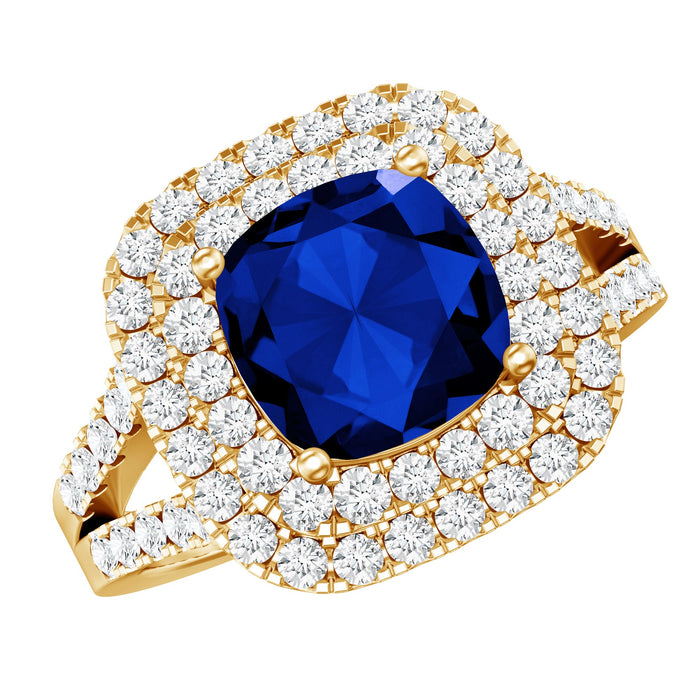 Cushion cut 2.7 carat blue sapphire engagement ring with double halo and rose gold setting by Rosec Jewels.