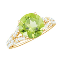 Rosec Jewels peridot solitaire engagement ring with moissanite, featuring a split shank design and detailed metal setting.