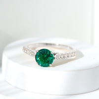 Lab Created Emerald Solitaire Engagement Ring with Diamond Side Stones