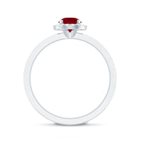 Minimal 0.6 Carat Ruby Engagement Ring with Diamond Halo