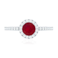 Minimal 0.6 Carat Ruby Engagement Ring with Diamond Halo