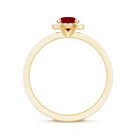 Minimal 0.6 Carat Ruby Engagement Ring with Diamond Halo