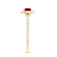 Minimal 0.6 Carat Ruby Engagement Ring with Diamond Halo