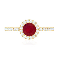 Minimal 0.6 Carat Ruby Engagement Ring with Diamond Halo