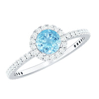Genuine blue aquamarine ring with diamond accents from Rosec Jewels, featuring a silver band and detailed gemstone setting.