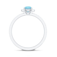 Genuine blue aquamarine ring with diamond accents from Rosec Jewels, featuring a large central aquamarine gemstone and sparkling side diamonds.