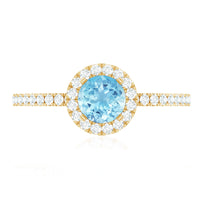 Genuine blue aquamarine ring with diamond accents from Rosec Jewels, featuring a detailed silver band and elegant design.