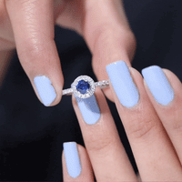Minimal 0.9 Carat Blue Sapphire Engagement Ring with Diamond Halo
