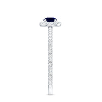 Minimal 0.9 Carat Blue Sapphire Engagement Ring with Diamond Halo