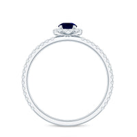 Minimal 0.9 Carat Blue Sapphire Engagement Ring with Diamond Halo