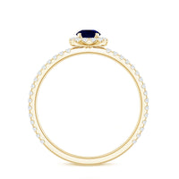 Minimal 0.9 Carat Blue Sapphire Engagement Ring with Diamond Halo