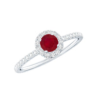 Real 0.6 carat ruby engagement ring with diamond halo by Rosec Jewels, featuring a central ruby and sparkling diamond accents.