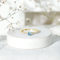 Real Aquamarine Solitaire Ring with Diamond Side Stones