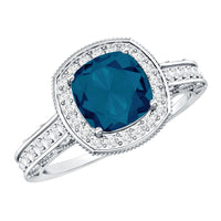 2.8 Carat Cushion Cut London Blue Topaz Halo Engagement Ring with Diamond