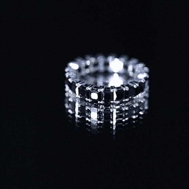 Certified black spinel princess cut eternity band ring by Rosec Jewels with sparkling black gemstones set in a sleek silver band.