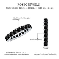 Certified black spinel princess cut eternity band ring by Rosec Jewels with sparkling black gemstones and a sleek silver band.