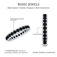 Channel set black spinel eternity ring by Rosec Jewels with black gemstones in a continuous band on a silver-tone ring