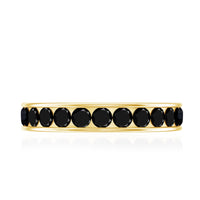 Channel set black spinel eternity ring by Rosec Jewels, showcasing a continuous row of sparkling black spinel stones on a sleek band.