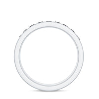Black Spinel eternity ring with channel setting, crafted by Rosec Jewels, designed for anniversaries, showcasing a sleek and elegant band.
