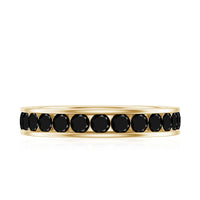Black spinel eternity ring with channel-set design from Rosec Jewels, showcasing a continuous row of sparkling stones on a sleek band.