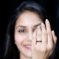 Black spinel eternity band ring featuring 2.25 carats of stones set in a sleek Rosec Jewels ring design.