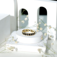 Black spinel eternity band ring with 2.25 carats from Rosec Jewels, featuring a continuous row of sparkling stones.