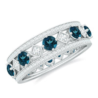Vintage-inspired eternity ring featuring London Blue Topaz and diamonds by Rosec Jewels, showcasing intricate design and sparkling gemstones.