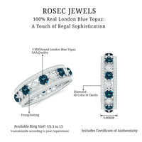 London Blue Topaz vintage-inspired eternity ring with diamonds by Rosec Jewels, showcasing detailed design and sparkling gemstone accents.