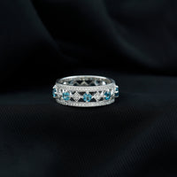 Vintage-inspired London Blue Topaz eternity ring with diamonds by Rosec Jewels, featuring a band of vibrant blue gemstones and sparkling diamonds.