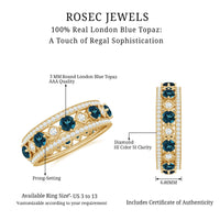 Rosec Jewels vintage-inspired London Blue Topaz eternity band ring with diamond accents, showcasing intricate design and sparkling gemstones.