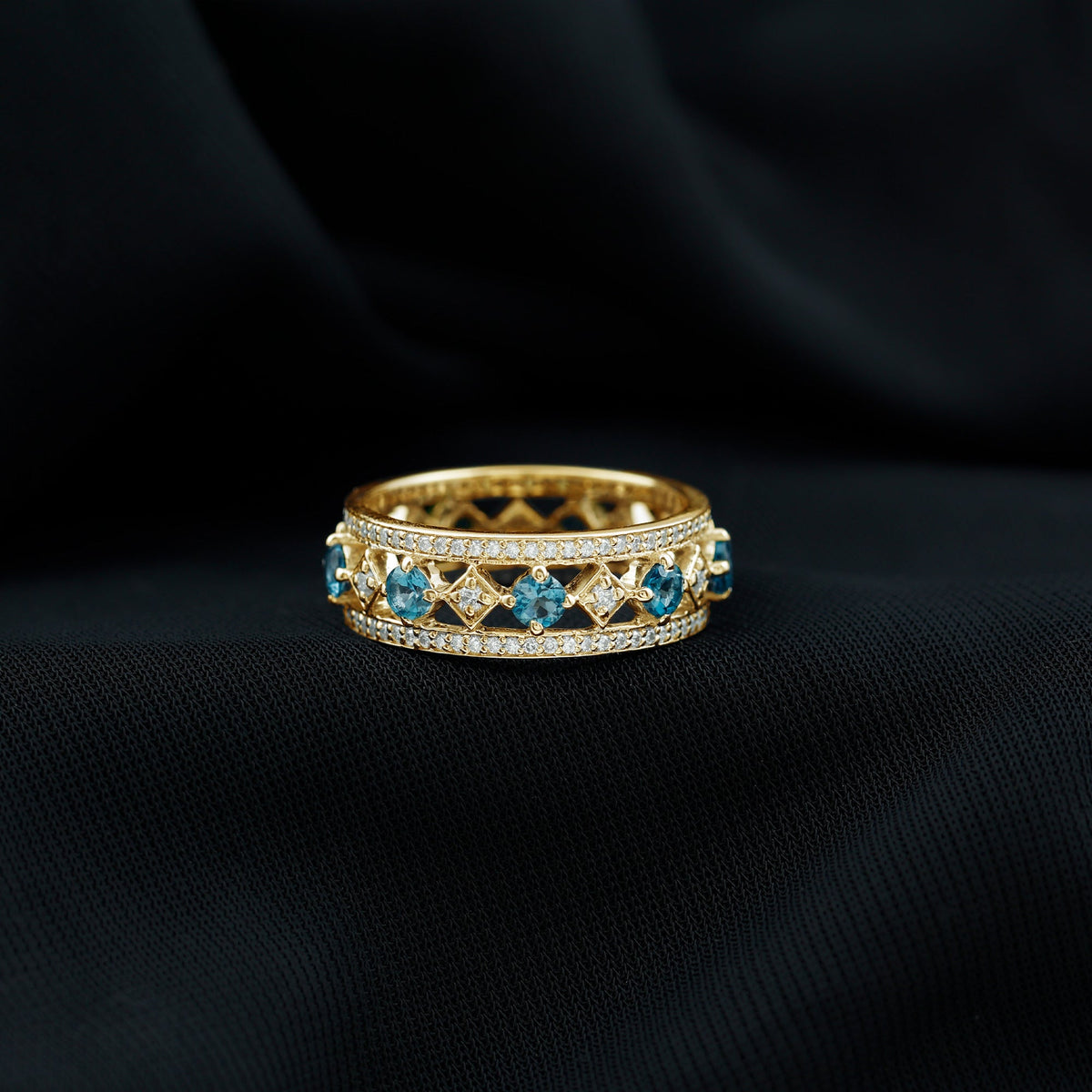Vintage-inspired London Blue Topaz eternity ring with diamonds by Rosec Jewels, showcasing a band with blue topaz and sparkling diamonds.
