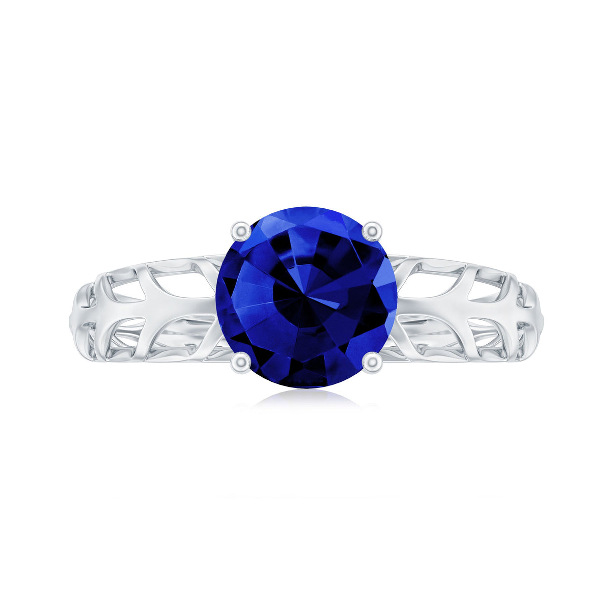 Lab-created blue sapphire solitaire ring with filigree shank by Rosec Jewels, featuring a sparkling blue gemstone and intricate metalwork.