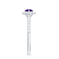 Real Amethyst promise ring with diamond halo featuring a purple gemstone surrounded by sparkling diamonds, set in a silver band.