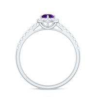 Real amethyst promise ring with diamond halo from Rosec Jewels, showcasing a purple gemstone surrounded by sparkling diamonds.