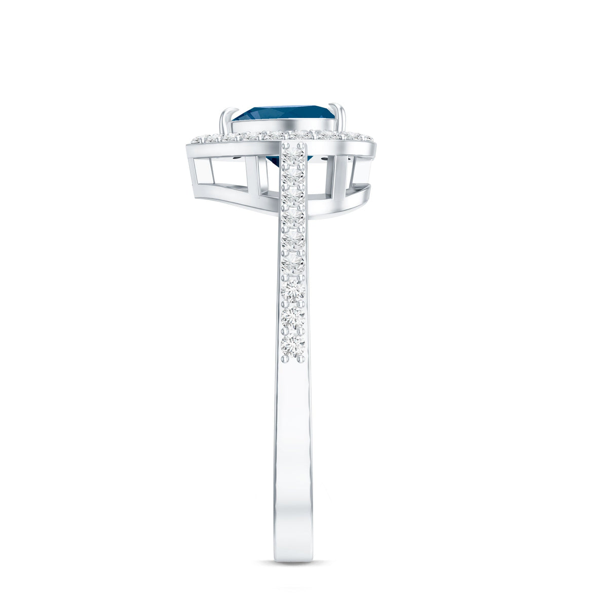 Heart-shaped London Blue Topaz engagement ring with diamond halo by Rosec Jewels, featuring a silver band and intricate detailing.