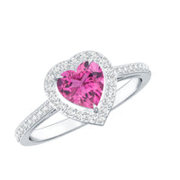 Pink heart-shaped tourmaline engagement ring with diamond halo by Rosec Jewels, showcasing a sparkling center stone and elegant design.
