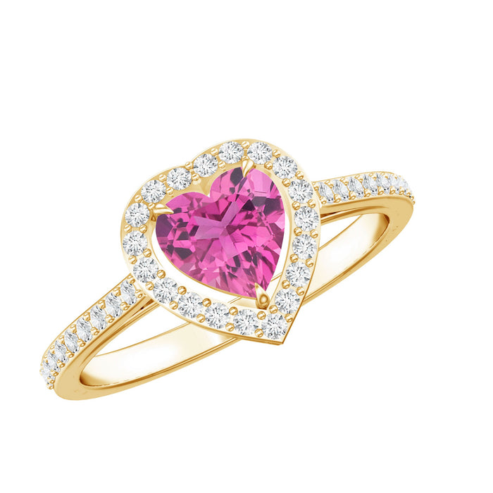 Pink heart-shaped tourmaline engagement ring with diamond halo from Rosec Jewels, showcasing a sparkling romantic design.
