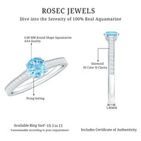Certified real aquamarine solitaire ring with diamond side stones, set in a elegant Rosec Jewels ring design.