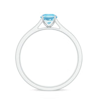 Certified real aquamarine solitaire ring with diamond side stones, showcasing a elegant gemstone setting and fine craftsmanship.