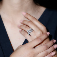 Silver moissanite cluster statement ring by Rosec Jewels featuring sparkling gemstone accents and intricate design details.
