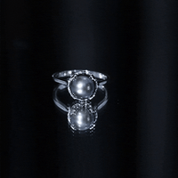 Handcrafted Black Tahitian Pearl engagement ring from Rosec Jewels featuring a lustrous black pearl set in a elegant ring band.
