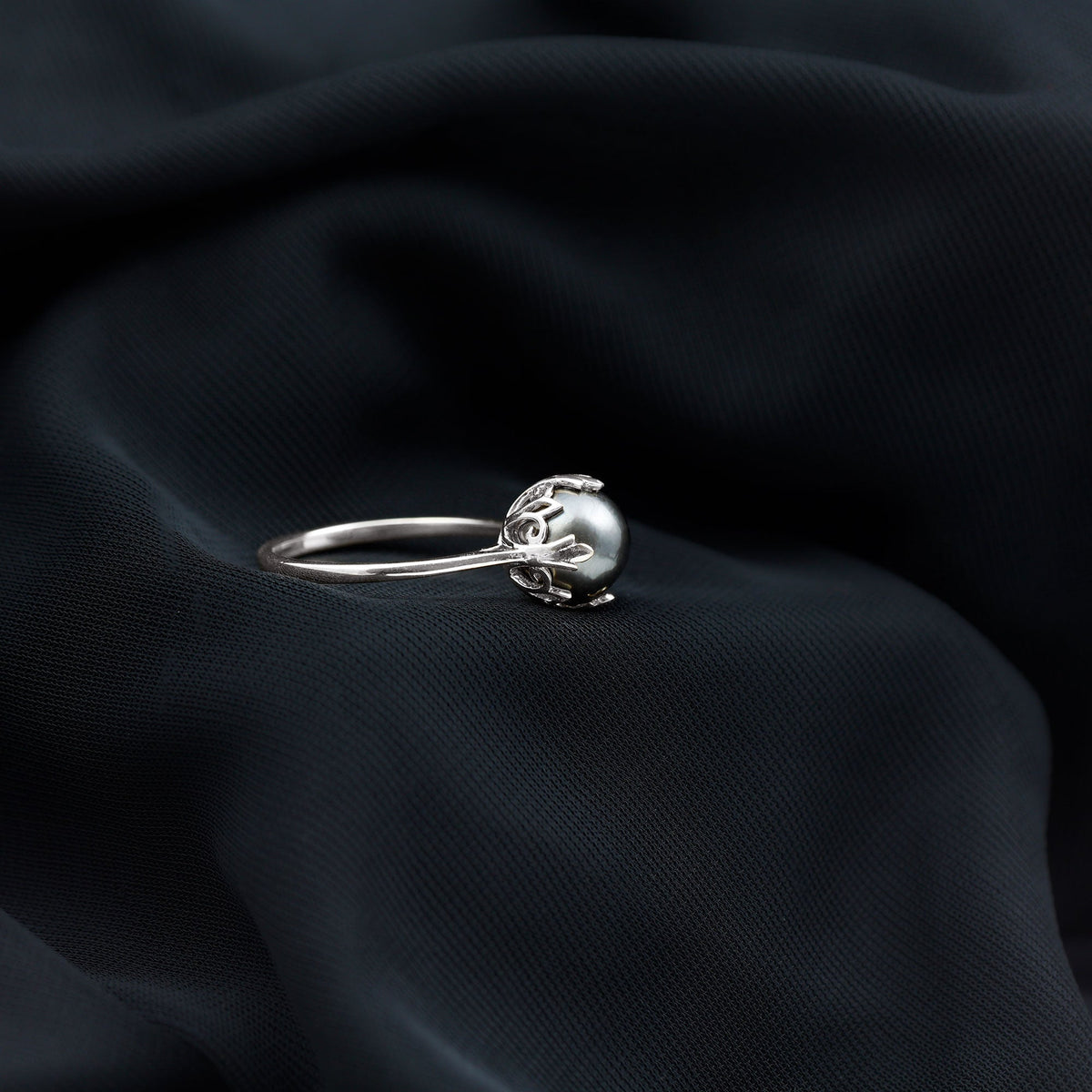 Handcrafted Black Tahitian Pearl engagement ring by Rosec Jewels featuring a lustrous black pearl set in a sleek ring band.
