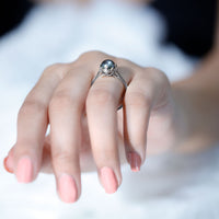 Handpicked genuine black Tahitian pearl engagement ring with silver band, featuring a lustrous black pearl set in a delicate rose gold design.