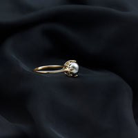 Handpicked genuine black Tahitian pearl engagement ring with a silver band, featuring a lustrous round pearl and elegant design.