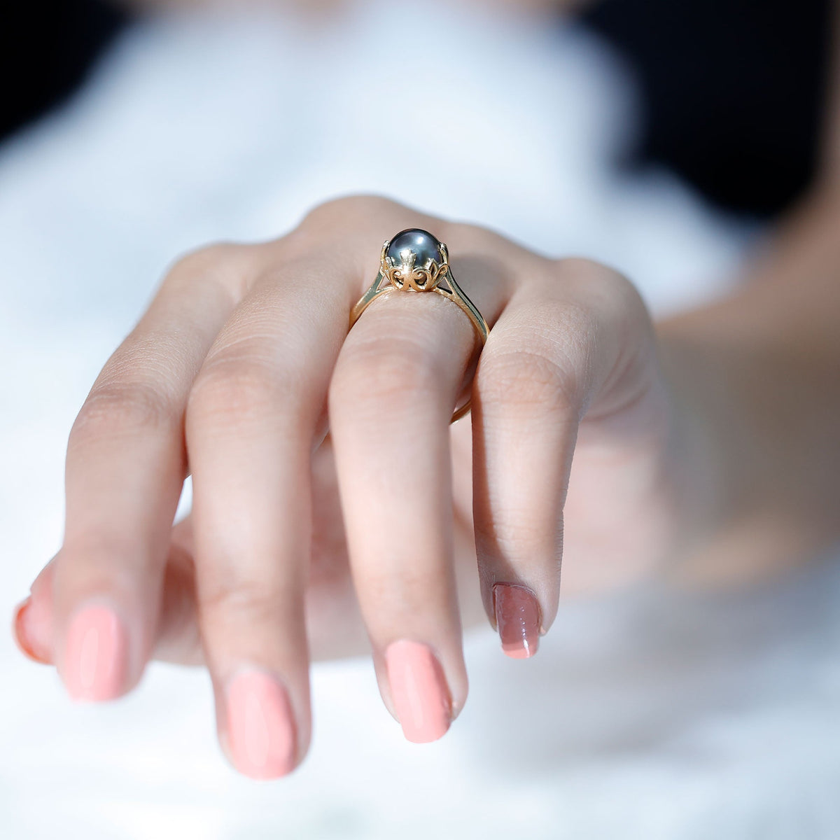 Handcrafted black Tahitian pearl engagement ring from Rosec Jewels, featuring a lustrous black pearl set on a sleek silver band.