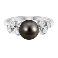 Tahitian black pearl and diamond leaf engagement ring by Rosec Jewels, featuring a sleek gold band and intricate leaf design.
