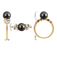 Tahitian black pearl and diamond leaf engagement ring by Rosec Jewels, featuring a sleek gold band and intricate leaf design.
