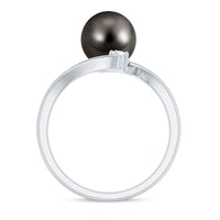 Tahitian black pearl bypass engagement ring with diamond accents from Rosec Jewels, showcasing elegant gold band and unique design.